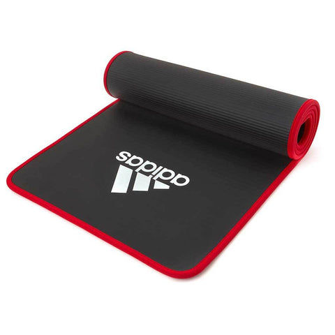adidas training mat is available in black with red edging.